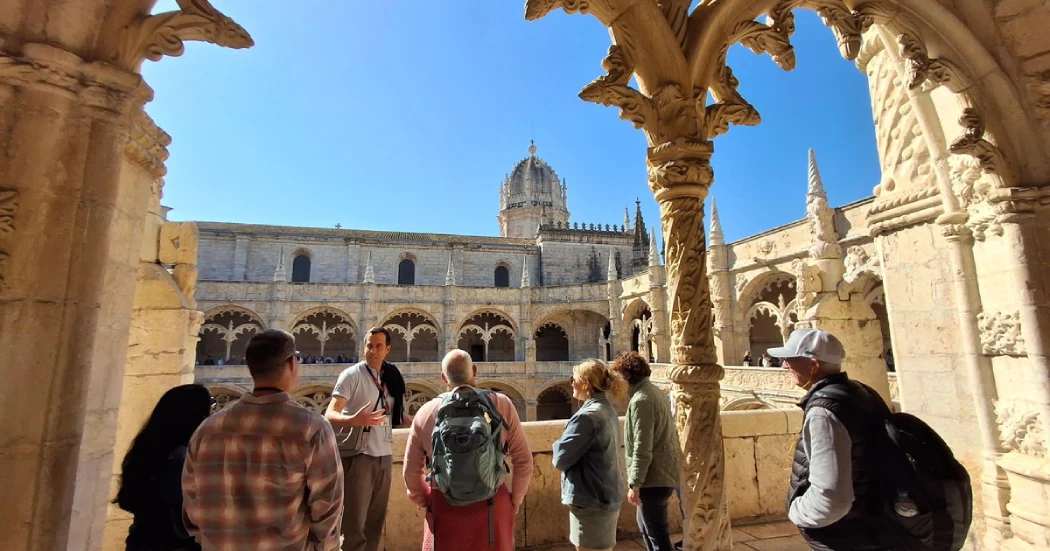 A guide sharing the history of the Monastery