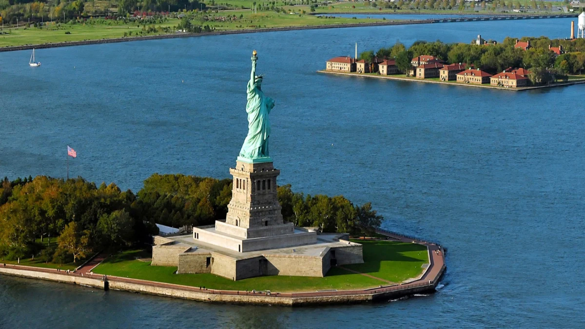 Liberty Statue and Ellis Island The aerial view of the Liberty Statue and Ellis Island