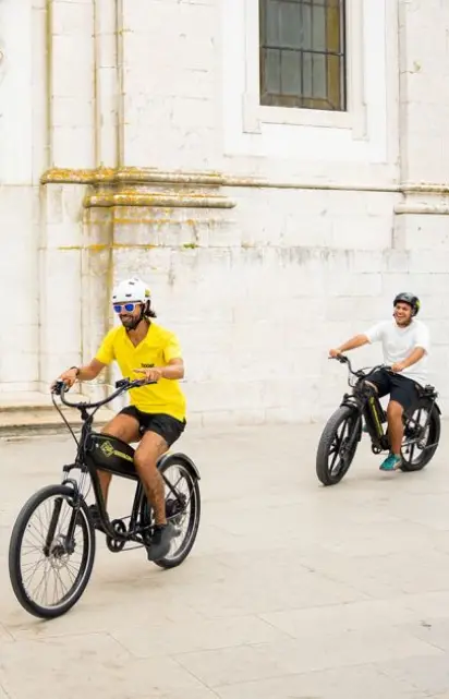 Tourists going on a bike tour in Lisbon