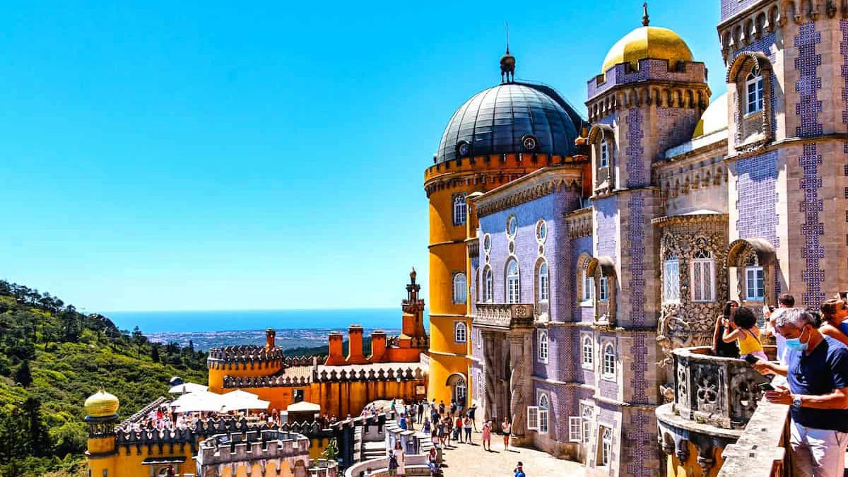 Visitors on a day trip from Lisbon to Sintra, visiting the Pena Palace